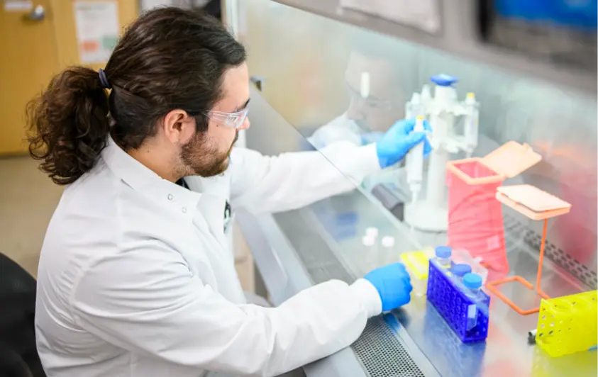 A climatetech entrepreneur at work in a Greentown lab