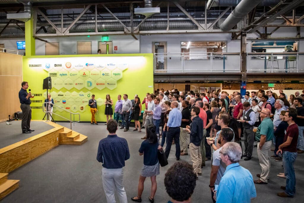Founders pitching from the stage at a Greentown Labs event